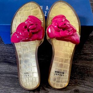 Stuart Weitzman soft patent flower flip flops